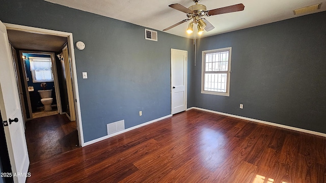 153 E Buena Vista Ave, Goodyear, AZ 85338 - spare room featuring wood finished floors, a smoke detector, and ceiling fan