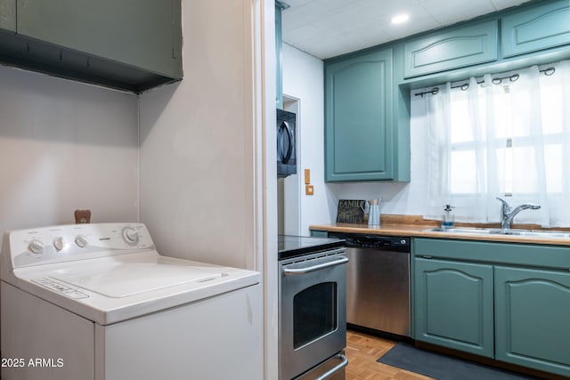 153 E Buena Vista Ave, Goodyear, AZ 85338 - laundry area with washer / dryer and a sink