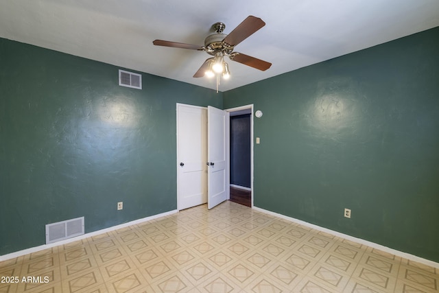 153 E Buena Vista Ave, Goodyear, AZ 85338 - spare room with light floors and a ceiling fan