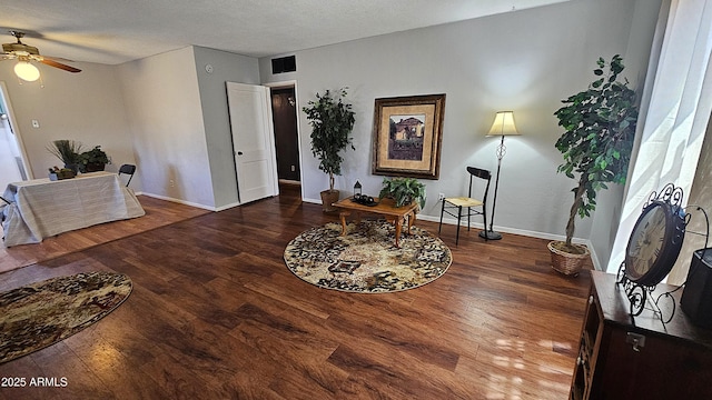 153 E Buena Vista Ave, Goodyear, AZ 85338 - living room with a ceiling fan, wood finished floors, and a textured ceiling