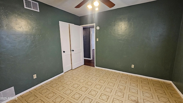 153 E Buena Vista Ave, Goodyear, AZ 85338 - empty room with ceiling fan and light flooring