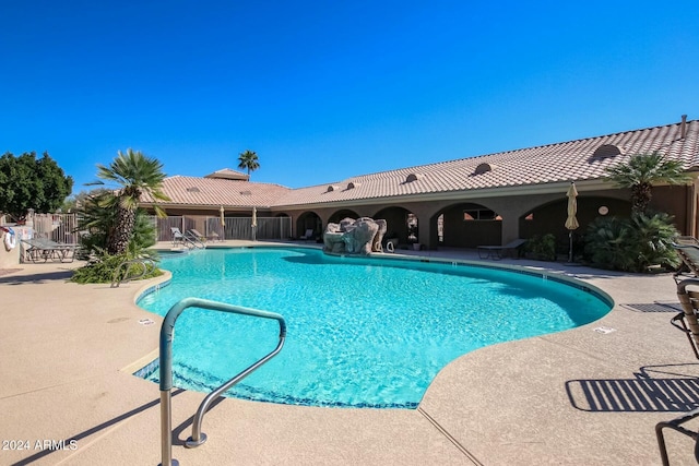 view of pool featuring a patio area