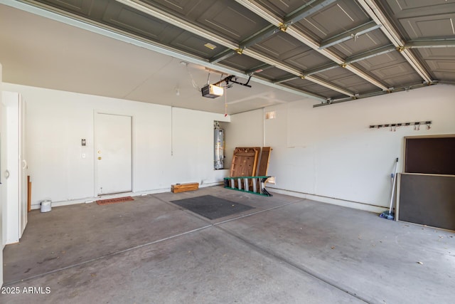 garage with a garage door opener and water heater