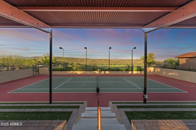 view of tennis court with a mountain view and basketball court