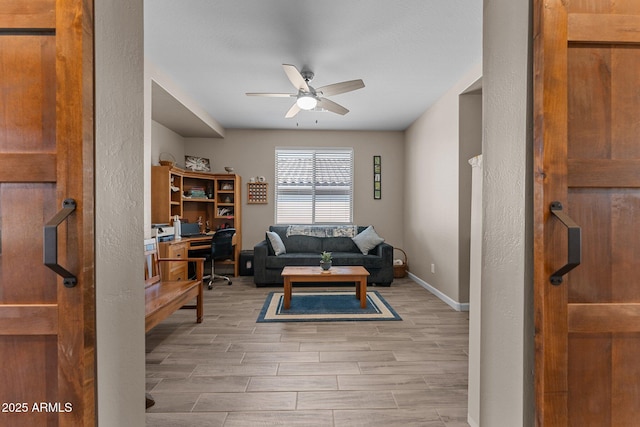 living room with ceiling fan