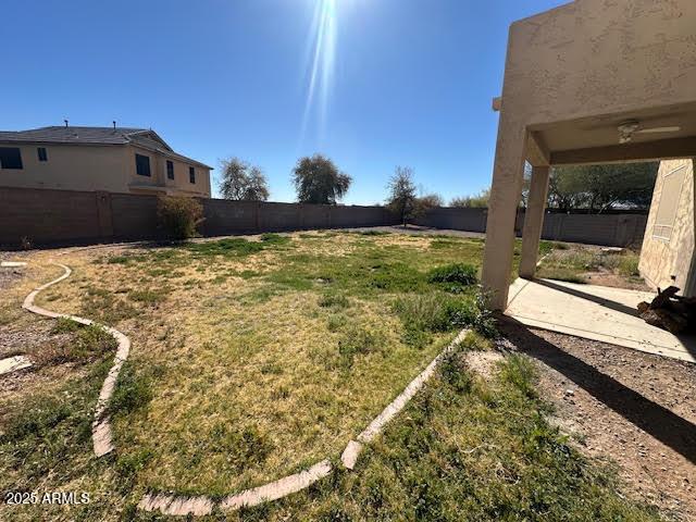 view of yard with a fenced backyard