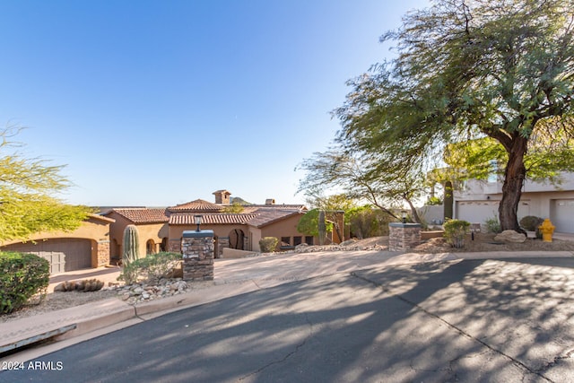 view of front of property with a garage