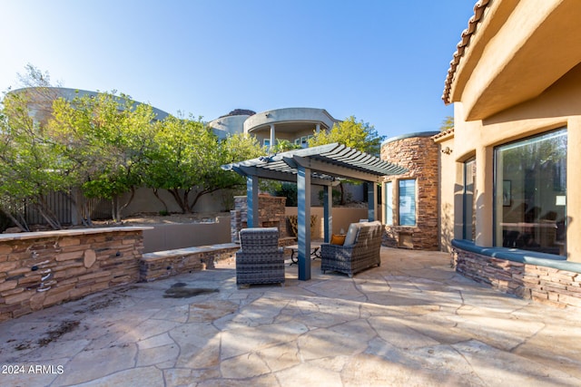 view of patio / terrace featuring a pergola