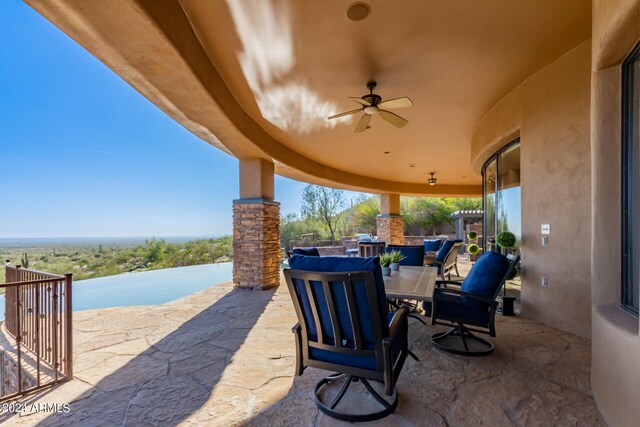 view of patio / terrace with ceiling fan