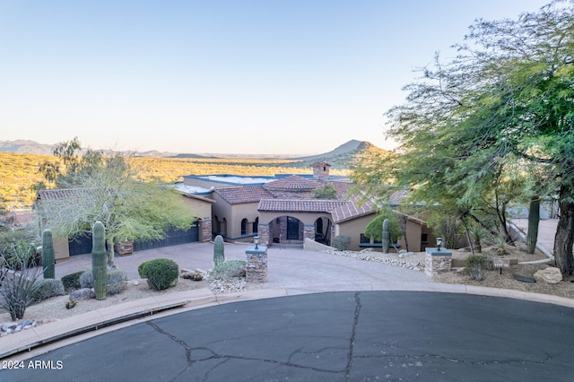 view of front of house featuring a mountain view