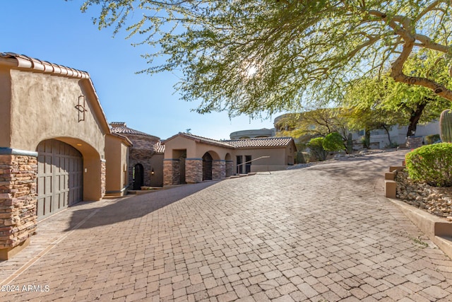 view of front of property with a garage