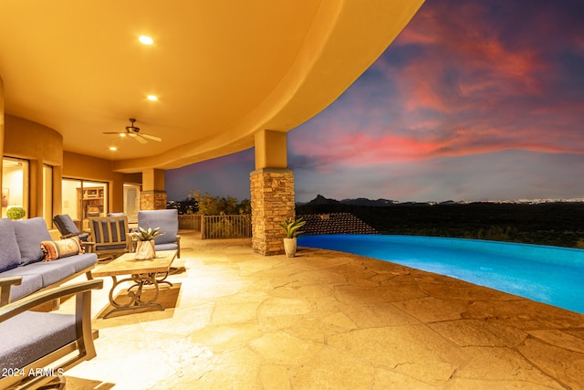 patio terrace at dusk with ceiling fan