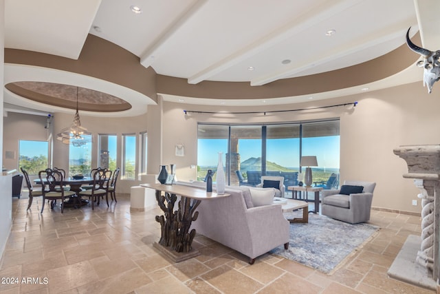 tiled living room featuring a chandelier