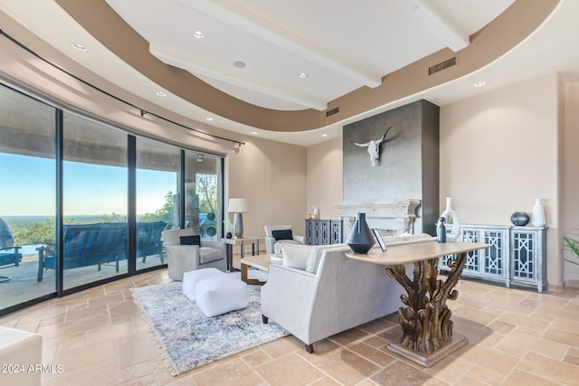 tiled living room with beamed ceiling