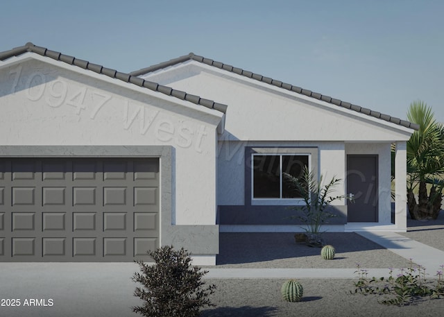 view of front of home with a garage