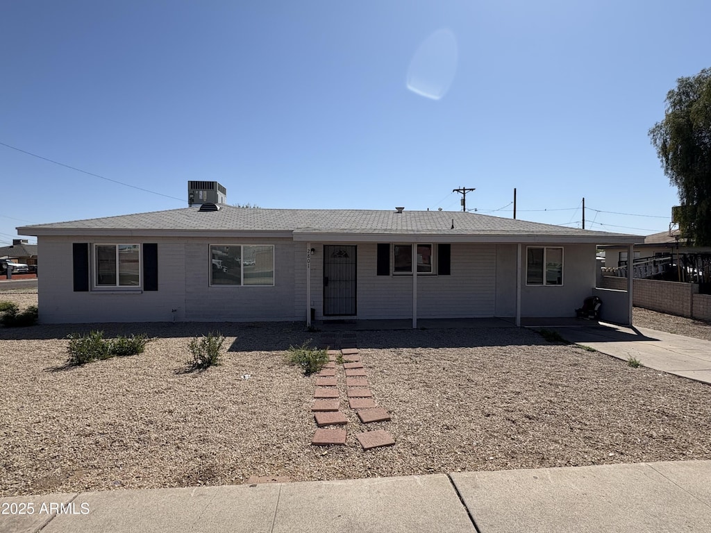 2801 W Camelback Rd, Phoenix, AZ 85017 - ranch-style home with cooling unit and fence
