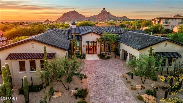 view of front of home with a mountain view