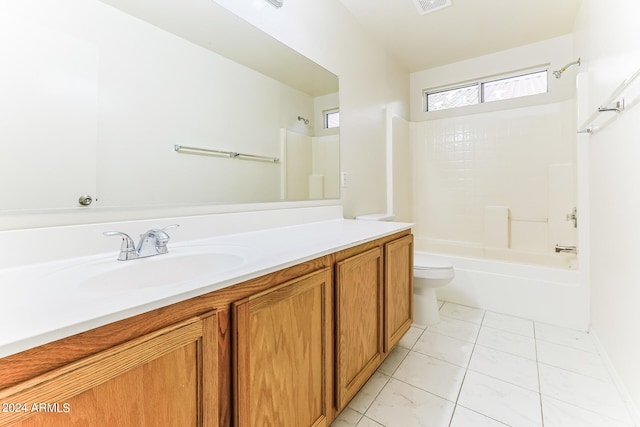 full bathroom featuring toilet, vanity, and washtub / shower combination