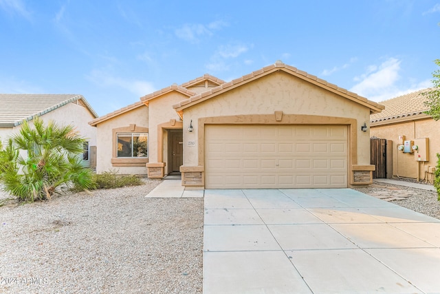 view of front of property with a garage