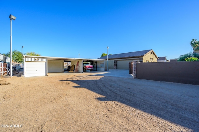 single story home featuring a carport