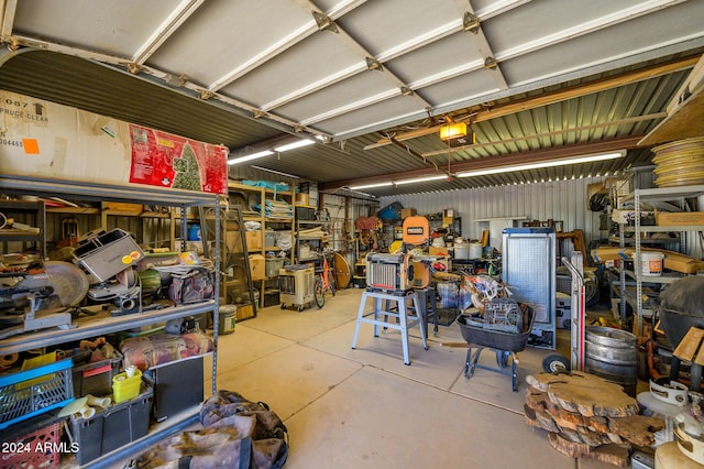5701 N 105th Ln, Glendale, AZ 85307 - garage featuring a workshop area and a garage door opener