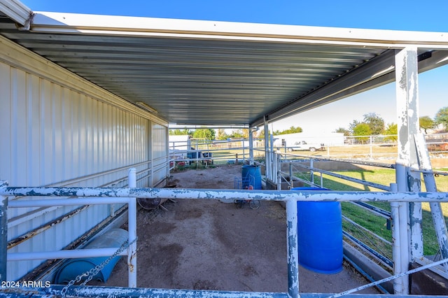 view of patio featuring an outbuilding