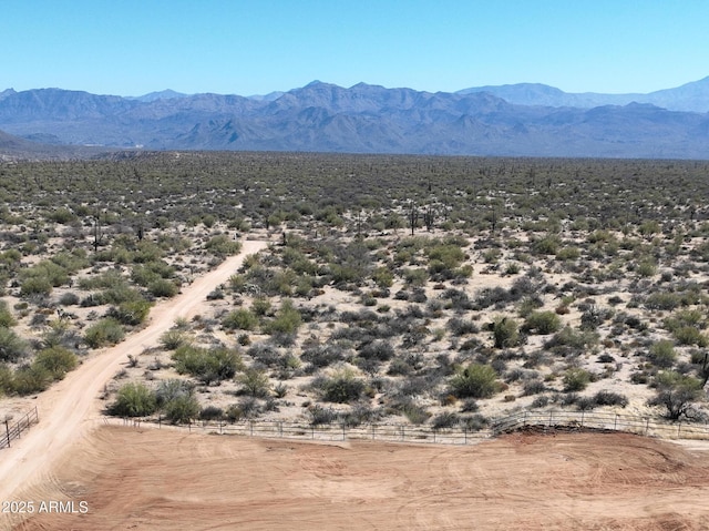 view of mountain feature with a rural view