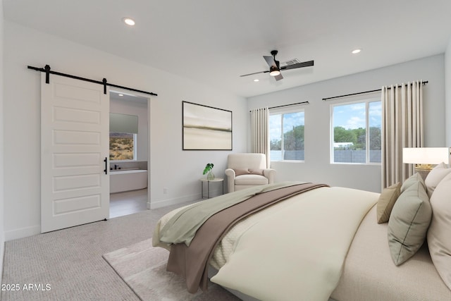 bedroom featuring baseboards, a barn door, carpet flooring, and recessed lighting