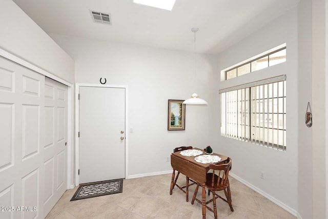 dining space featuring visible vents and baseboards