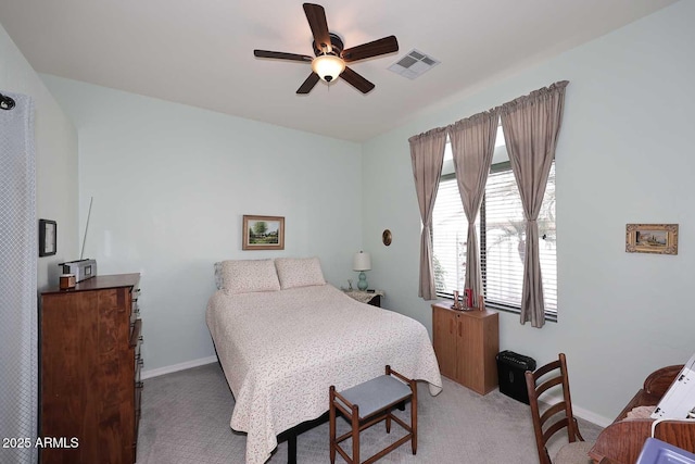 bedroom with carpet, visible vents, ceiling fan, and baseboards