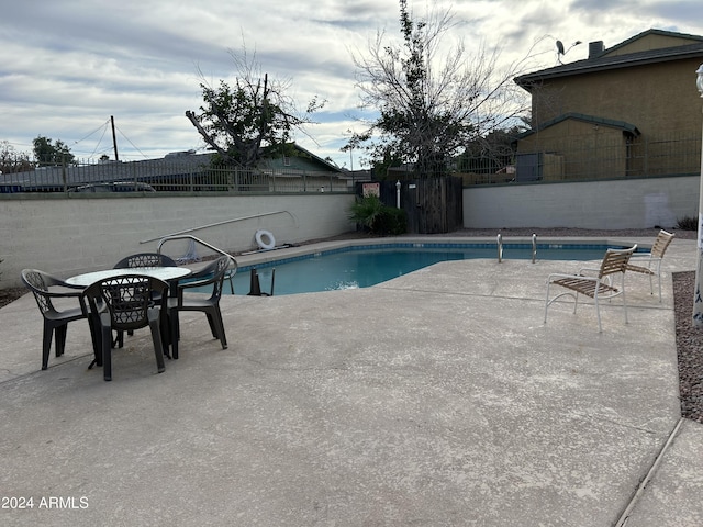 view of pool with a patio area