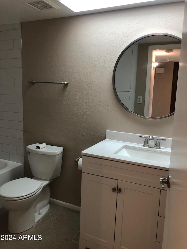 full bathroom featuring tile patterned flooring, shower with separate bathtub, vanity, and toilet