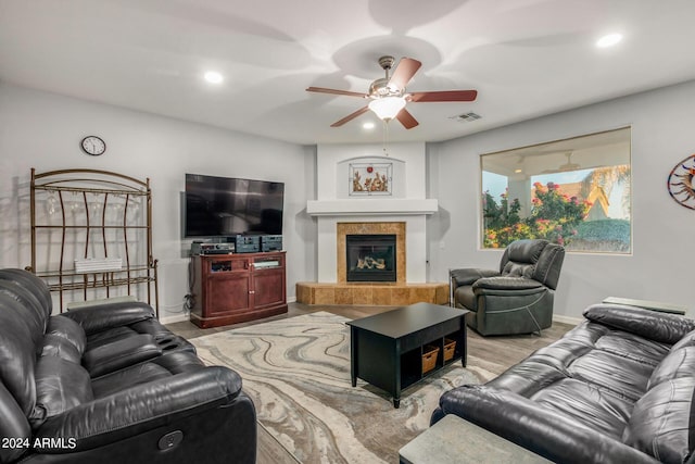 2977 E County Down Dr, Chandler, AZ 85249 - living area with ceiling fan, a fireplace, visible vents, recessed lighting, and baseboards