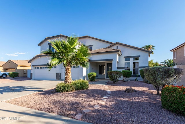 2977 E County Down Dr, Chandler, AZ 85249 - view of front of home with a tile roof, stucco siding, and concrete driveway