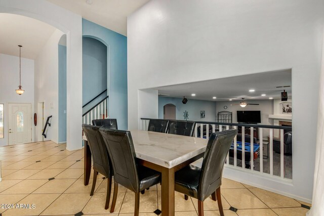 2977 E County Down Dr, Chandler, AZ 85249 - dining area featuring recessed lighting, tile patterned floors, a high ceiling, a ceiling fan, and stairs
