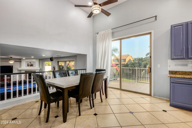 2977 E County Down Dr, Chandler, AZ 85249 - dining room with light tile patterned flooring, ceiling fan, a towering ceiling, and plenty of natural light