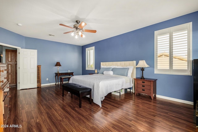 2977 E County Down Dr, Chandler, AZ 85249 - bedroom featuring visible vents, baseboards, and wood finished floors