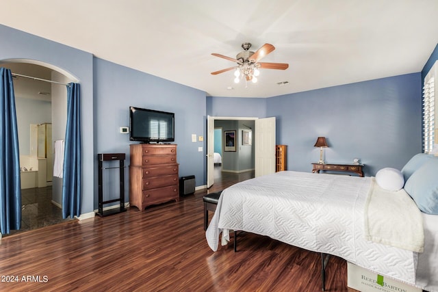 2977 E County Down Dr, Chandler, AZ 85249 - bedroom with baseboards, visible vents, ceiling fan, arched walkways, and wood finished floors