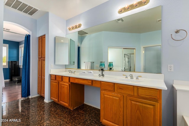 2977 E County Down Dr, Chandler, AZ 85249 - bathroom with double vanity, visible vents, baseboards, and a sink