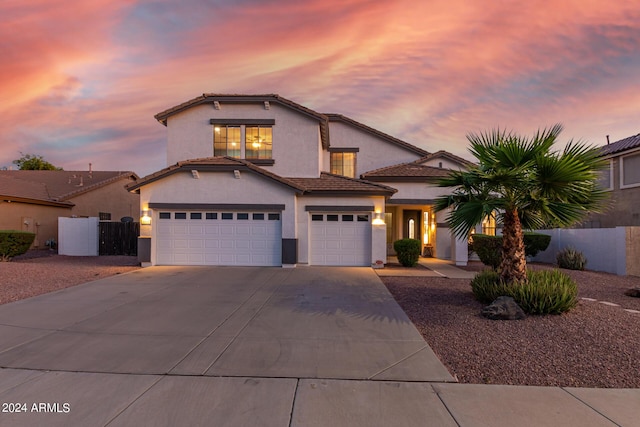 2977 E County Down Dr, Chandler, AZ 85249 - traditional home featuring stucco siding, fence, a tile roof, an attached garage, and driveway