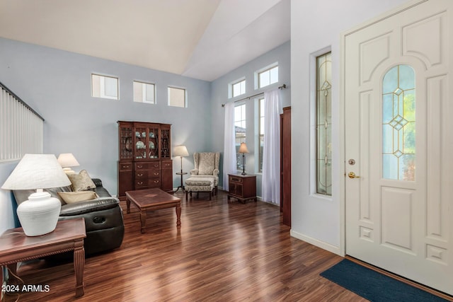 2977 E County Down Dr, Chandler, AZ 85249 - entryway with baseboards, high vaulted ceiling, and wood finished floors