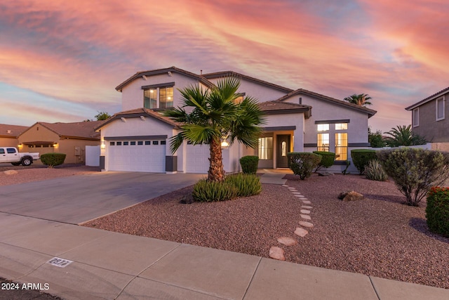 2977 E County Down Dr, Chandler, AZ 85249 - view of front of home featuring concrete driveway, stucco siding, and a tiled roof