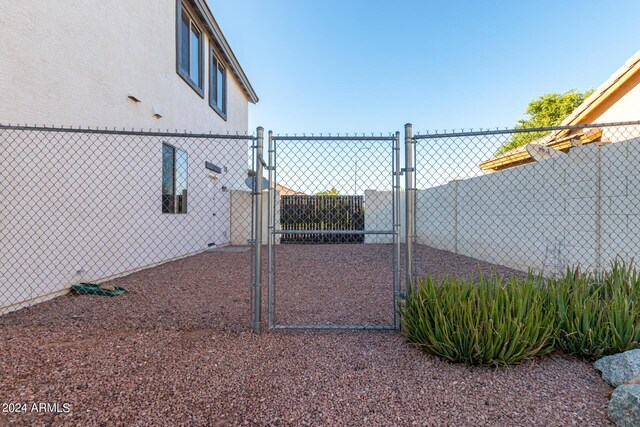 2977 E County Down Dr, Chandler, AZ 85249 - view of gate featuring fence