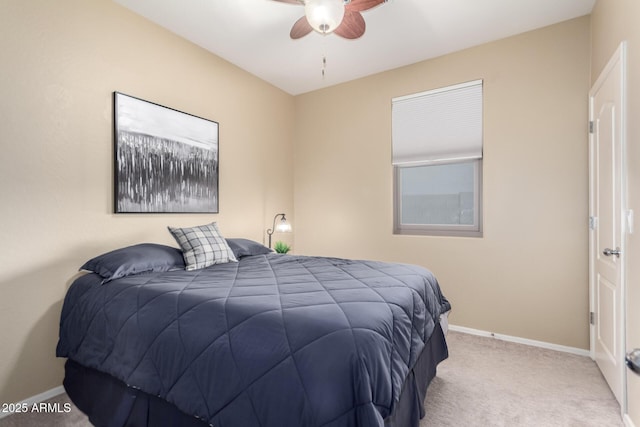 bedroom with carpet floors, baseboards, and a ceiling fan