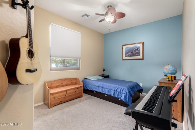 bedroom with carpet, ceiling fan, and baseboards