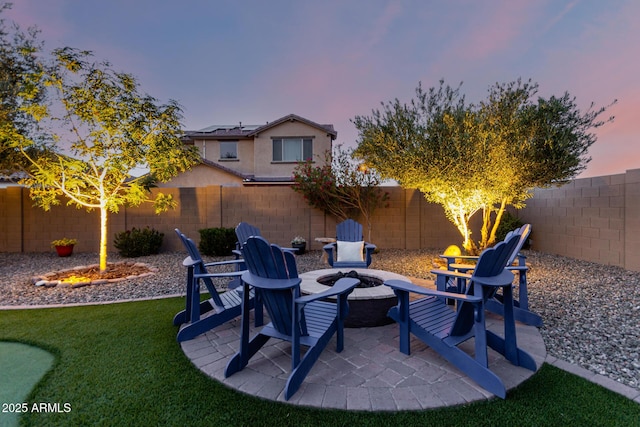 view of patio with a fire pit