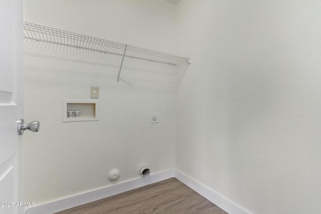 laundry area with washer hookup, hardwood / wood-style flooring, hookup for an electric dryer, and gas dryer hookup