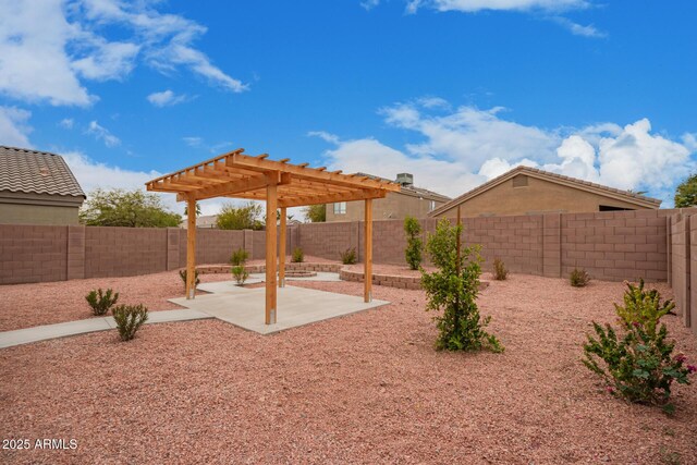 view of yard with a pergola and a patio area