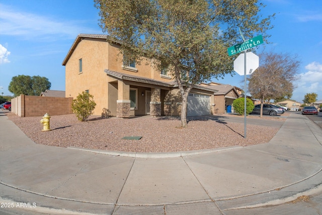 view of front of property featuring a garage