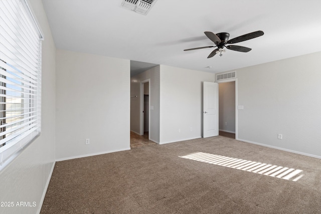 unfurnished bedroom featuring carpet and ceiling fan